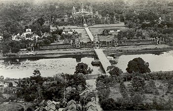 View from a hillside of a palace and its gardens